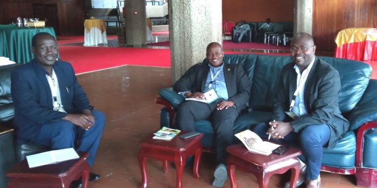 r. Casim Umba Tolo (L), Prof. Jude Lubega (M) and Dr. Drake Patrick Mirembe (R) at KICC Nairobi Discussing the Implementation of PHARMBIOTRAC ICT Starnd.
